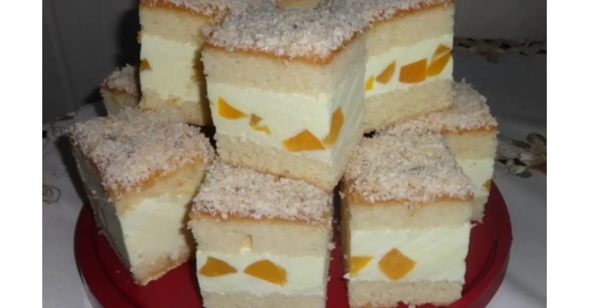 Tort cu cremă de brânză și piersici din compot – desert fin și răcoritor